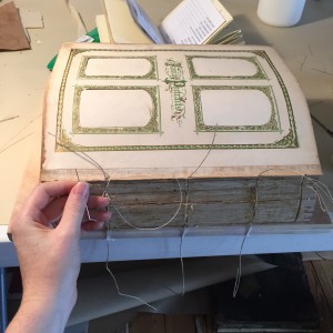 Sewing the whole book back together on sunken cords